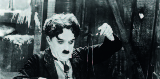 Charlie Chaplin eats his shoe in a scene from 1925 film gold Rush. Charlie Chaplin life story