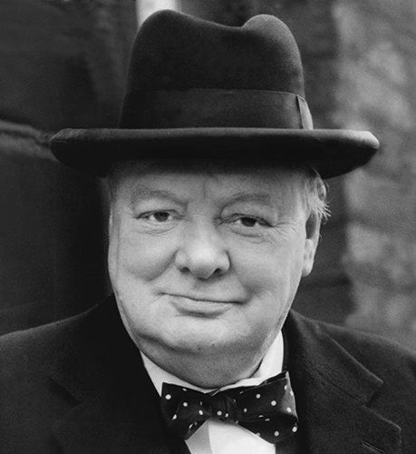 Winston Churchill in his trademark hat and bow tie. Credit: David Cole/Alamy