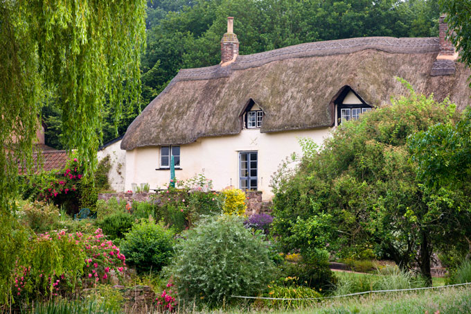 Thatched cottage in Crediton, Devon. Credit: Adam Burton/Robert Harding ...