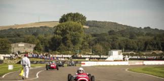 Vintage racing car on the racetrack at Goodwood Revival festival, Goodwood, England. Credit: Visit Britain