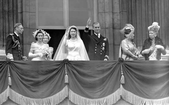 The Queen & Prince Philip wave from the royal balcony