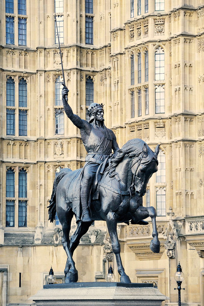 A statue of King Richard I stands outside the Houses of Parliament, London