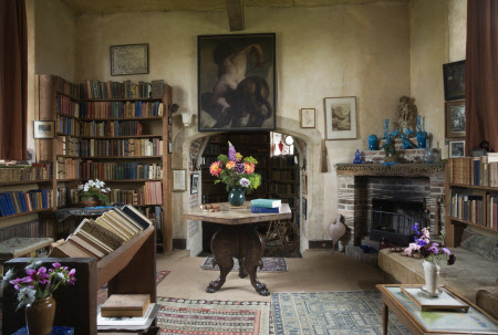 The Writing Room, looking towards the fireplace and hexagonal table, in the Tower at Sissinghurst Castle, Kent