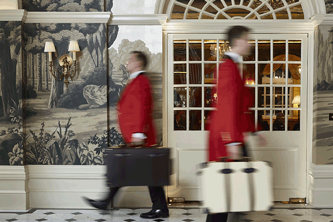 Footmen in the Front hall of The Goring Hotel, London
