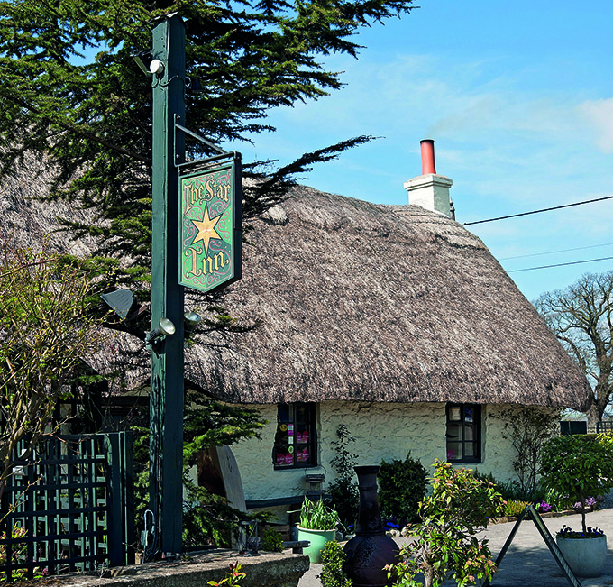 The beautiful thatched cottage of the Star Inn. England’s cosiest inns