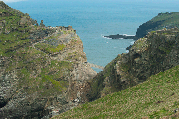 The ruins of Tintagel Castle on the Cornish coast. The steep cliffs and pathways along the cliff edge. The site of King Arthur's birthplace Credit: VisitEngland/Visit Cornwall/Adam Gibbard