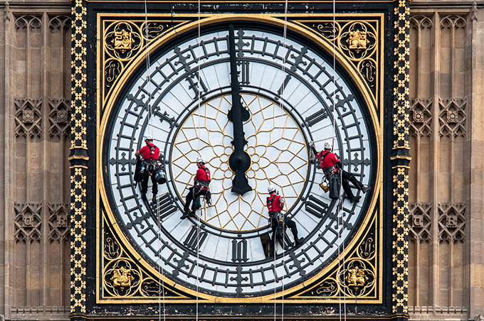 Workers on Big Ben’s clock face. Big Ben’s chimes sound for last time in four years